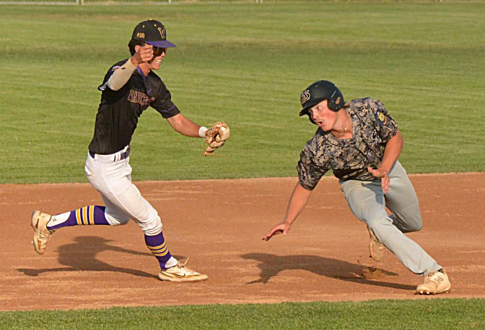 Watertown Post 17 shortstop Jack Heesch chases after Aberdeen Smittys base runner Zane Backous during Game 1 of their best-of-three American Legion Baseball regional playoff series on Thursday, July 20, 2023 at Watertown Stadium. Aberdeen won 15-4.