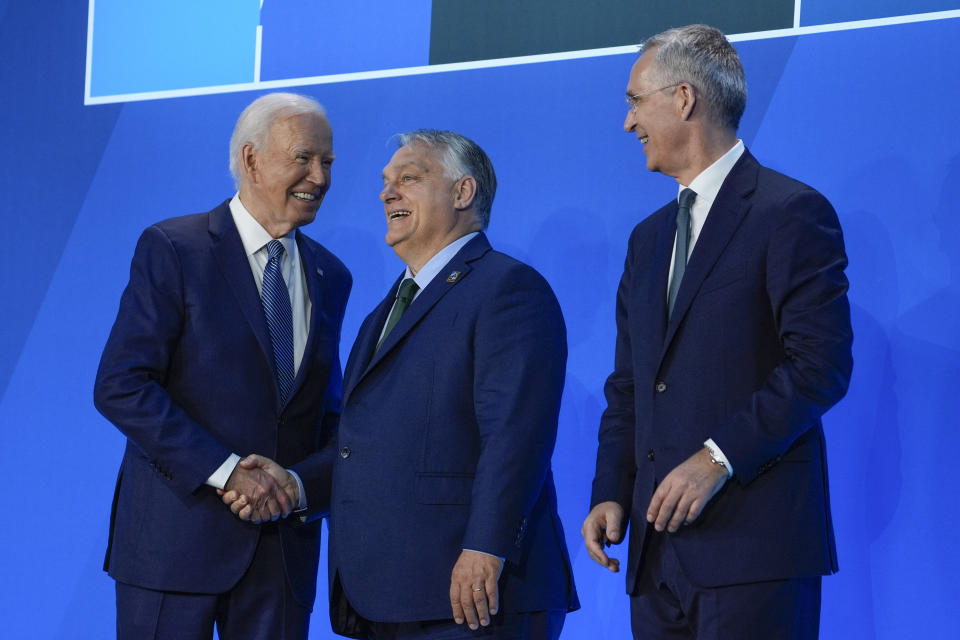 President Joe Biden and NATO Secretary General Jens Stoltenberg, right, welcome Hungary's Prime Minister Viktor Orban to the NATO Summit, Wednesday, July 10, 2024, in Washington. (AP Photo/Evan Vucci)