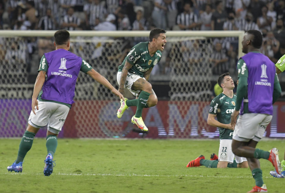 Dudu of Brazil's Palmeiras, center, celebrates with teammates at the end of a Copa Libertadores semifinal second leg soccer match against Brazil's Atletico Mineiro at the Mineirao stadium in Belo Horizonte, Brazil, Tuesday, Sept. 28, 2021. The match ended 1-1 on aggregate and Palmeiras advanced to the final due to an away goal. (Washington Alves/Pool via AP)