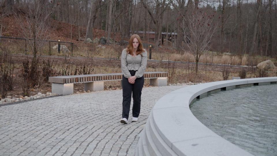 PHOTO: Jackie Hegarty, a survivor of the 2012 shooting at Sandy Hook Elementary School, visits the Sandy Hook Permanent Memorial in Newtown, Connecticut. (Adam Wolffbrandt/ABC News)