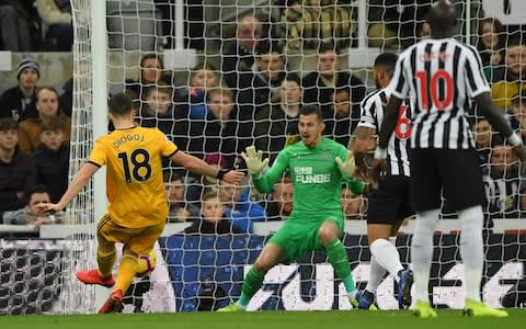 Diogo Jota of Wolverhampton Wanderers scores his team's first goal past Martin Dubravka of Newcastle United - Credit: Stu Forster/Getty Images