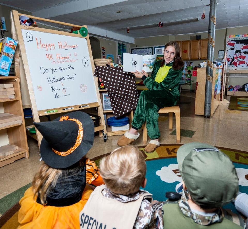 Rylee Dickinson, senior at Beaver Dam High School, leads the 4K class reading time at at Community Care Preschool & Child Care Inc. on Tuesday October 31, 2023 in Beaver Dam, Wis.