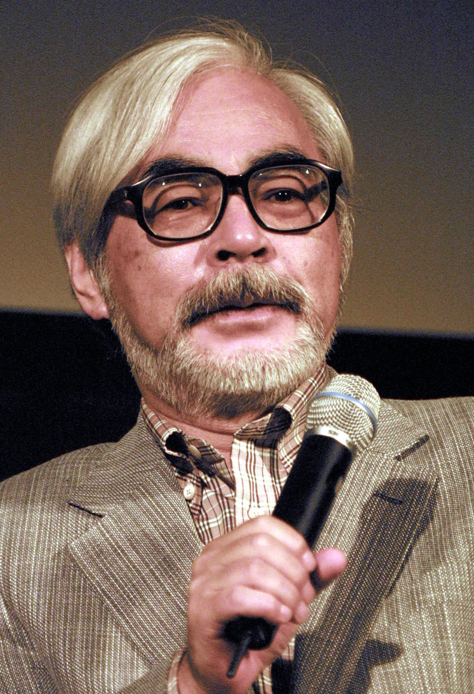 Director Hayao Miyazaki speaks during a press conference and screening of the film 