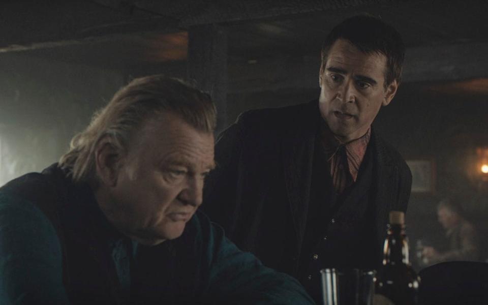 Swaddled in a stygian gloom: Brendan Gleeson and Colin Farrell's characters spend much of their time in the pub - Searchlight Pictures via AP