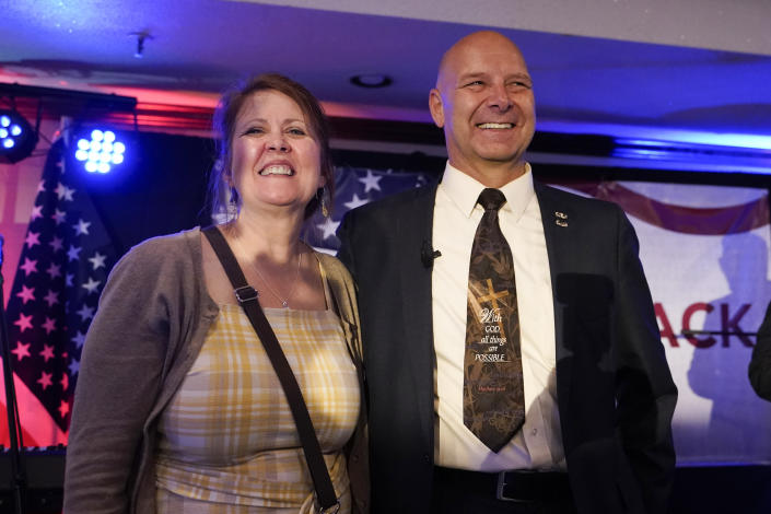 State Sen. Doug Mastriano, R-Franklin, a Republican candidate for Governor of Pennsylvania, and his wife Rebbeca stand on stage at a primary night election gathering in Chambersburg, Pa., Tuesday, May 17, 2022. (AP Photo/Carolyn Kaster)
