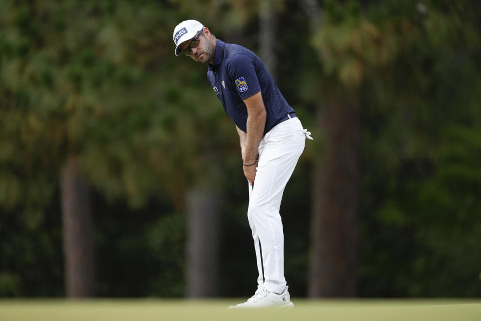 Corey Conners, of Canada, reacts after missing a putt on the eighth hole during the final round of the U.S. Open golf tournament Sunday, June 16, 2024, in Pinehurst, N.C. (AP Photo/Matt York)