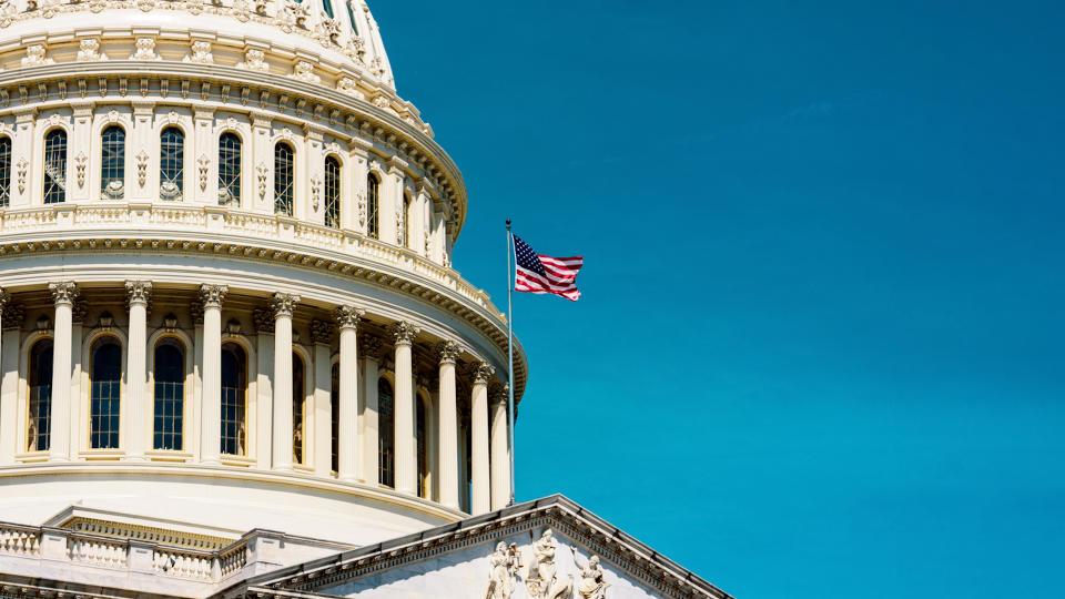 The United States Capitoldome background in retro style.