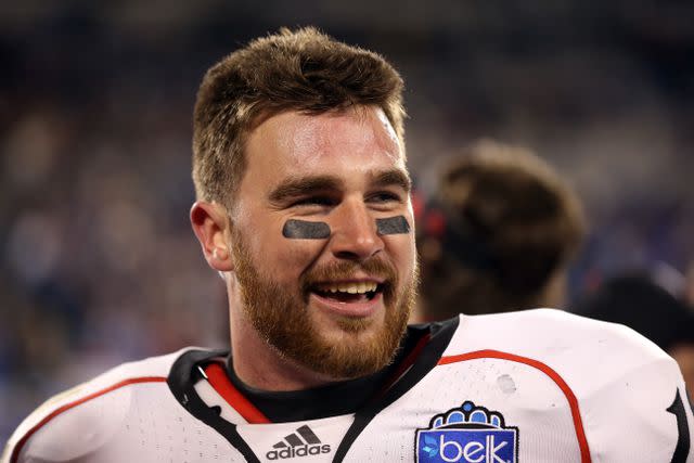 <p>Streeter Lecka/Getty </p> Travis Kelce after scoring the game winning touchdown against the Duke Blue Devils in 2012