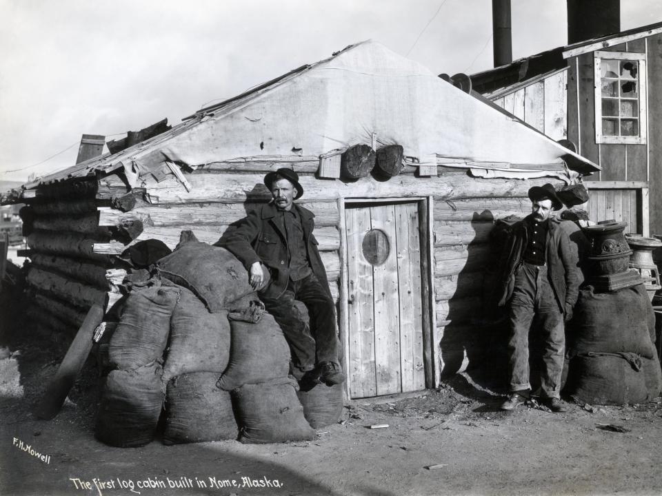 Klondike Goldrush: The first log cabin built in Nome, Alaska. 1900