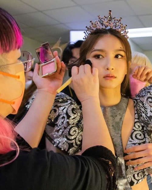 Getting the final touch-ups before the pageant 