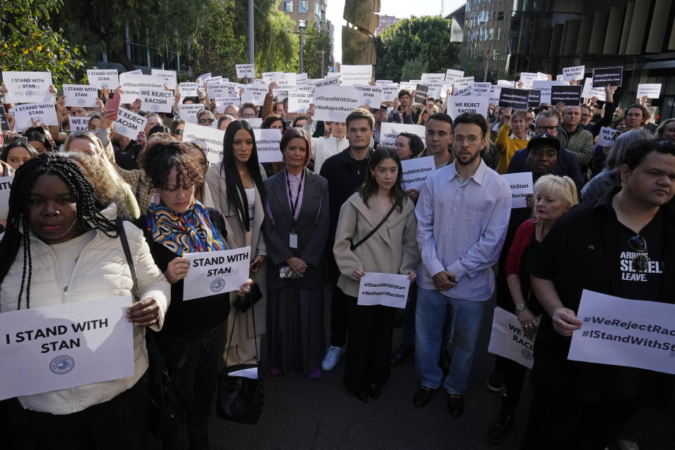 Australian Broadcasting Corp. (ABC) workers and other supporters gather at the ABC offices in Sydney, Monday, May 22, 2023, to support Indigenous journalist Stan Grant. Grant announced he would step away from television hosting duties after viewers responded with racist abuse to his comments during King Charles III's coronation about historic Aboriginal dispossession. (AP Photo/Rick Rycroft)