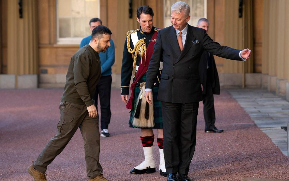 Mr Zelensky arrives at Buckingham Palace and is greeted by Clive Alderton, principal private secretary to the King - Kirsty O'Connor/AFP via Getty Images