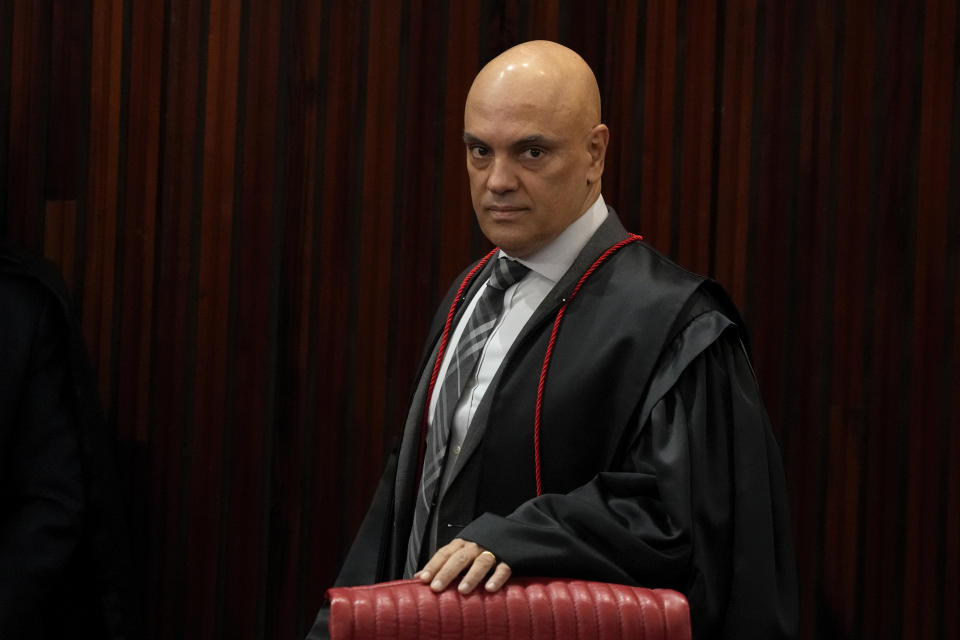 President of the Supreme Electoral Court, Minister Alexandre de Moraes, arrives to preside over the start of the trial of former President Jair Bolsonaro at the Supreme Court in Brasilia, Brazil, Thursday, June 22, 2023. Judges are evaluating the case which claims the leader abused his power by using government communication channels to promote his campaign and cast unfounded doubts on the country’s electronic voting system. (AP Photo/Eraldo Peres)