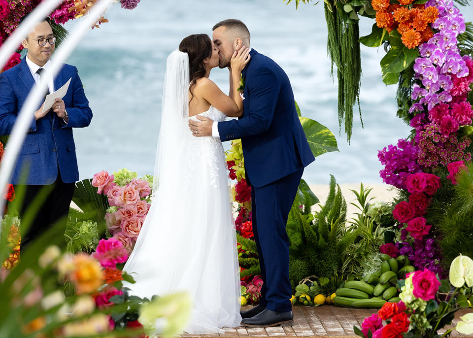 The MAFS bride and groom kiss