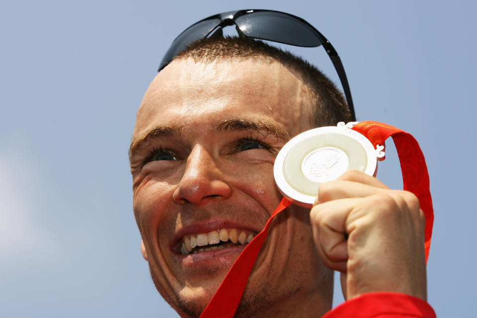 BEIJING - AUGUST 19: Silver medalist Simon Whitfield of Canada poses after the Mens Triathlon Final at the Triathlon Venue on Day 11 of the Beijing 2008 Olympic Games on August 19, 2008 in Beijing, China. (Photo by Adam Pretty/Getty Images)