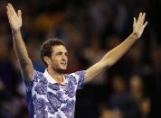 Tennis - Great Britain v United States of America - Davis Cup World Group First Round - Emirates Arena, Glasgow, Scotland - 6/3/15 Great Britain's James Ward waves to the crowd as he celebrates victory Action Images via Reuters / Andrew Boyers Livepic