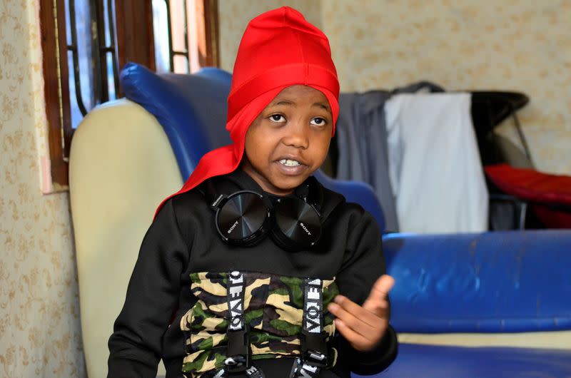 Ugandan eight-year-old rapper "Fresh Kid", whose real name is Patrick Ssenyonjo, speaks during an interview with Reuters in Bukoto, a suburb of Kampala