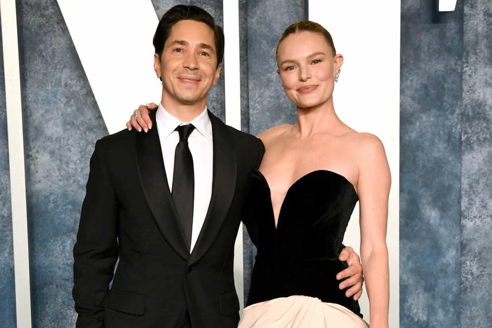 <p>Jon Kopaloff/Getty</p> Justin Long and Kate Bosworth attend the 2023 Vanity Fair Oscar Party.