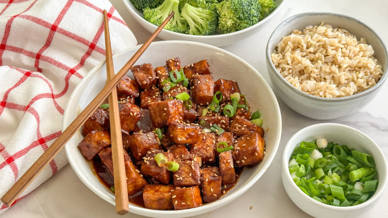 tofu with rice and broccoli, chopsticks