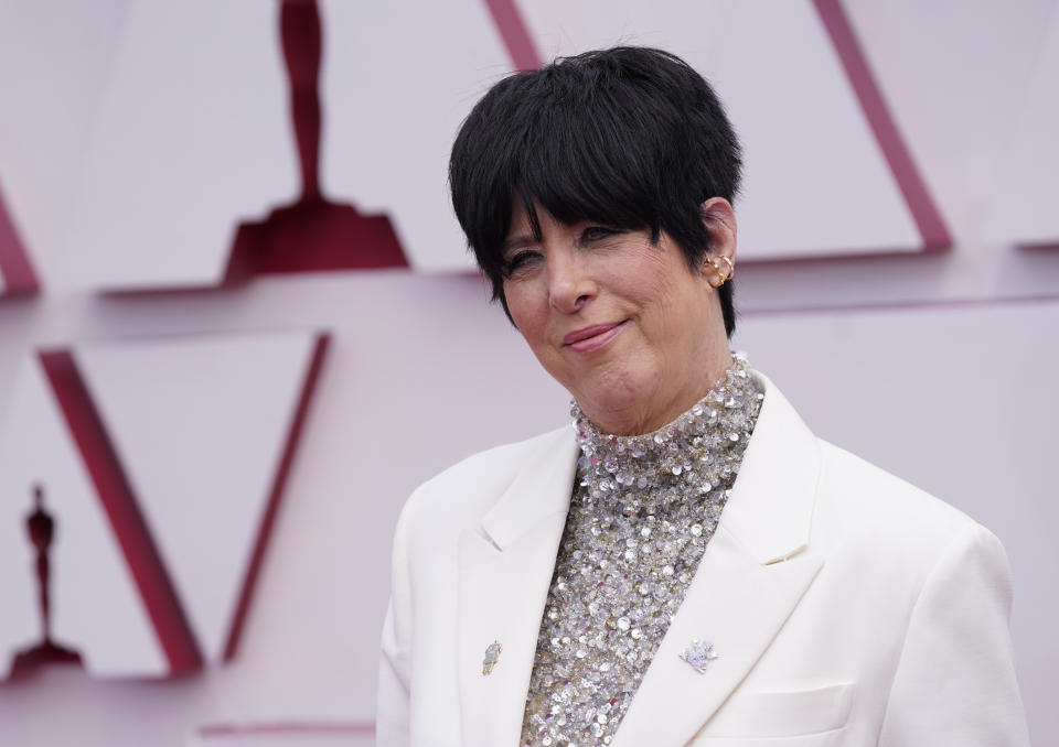 File-This April 25, 2021, file photo shows Diane Warren arriving at the Oscars at Union Station in Los Angeles. Warren stepped in Thursday, June 24, 2021, to save the life of cow that eluded capture for more than a day after a herd escaped from a Southern California slaughterhouse and stampeded through a suburb. The Grammy-winning artist contacted the city of Pico Rivera to arrange to have the cow sent to the Farm Sanctuary north of Los Angeles, Warren and City Manager Steve Carmona said. (AP Photo/Chris Pizzello, Pool, File)