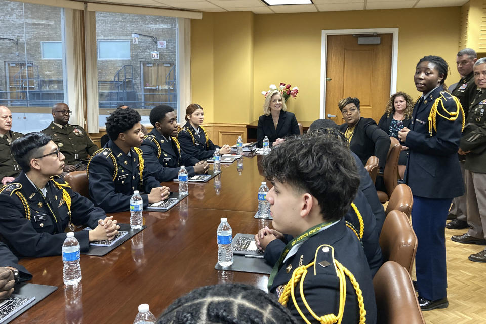 Army Secretary Christine Wormuth talks with members of the Junior Reserve Officers' Training Corps at the Chicago Military Academy in Chicago, on Feb. 15, 2023. Army recruiters are struggling to meet enlistment goals, and they say one of their biggest hurdles is getting back into high schools so they can meet students one on one. During three days of back-to-back meetings across Chicago last month, Wormuth met with students, school leaders, college heads, recruiters and an array of young people involved in ROTC or JROTC programs. (AP Photo/Lolita Baldor)