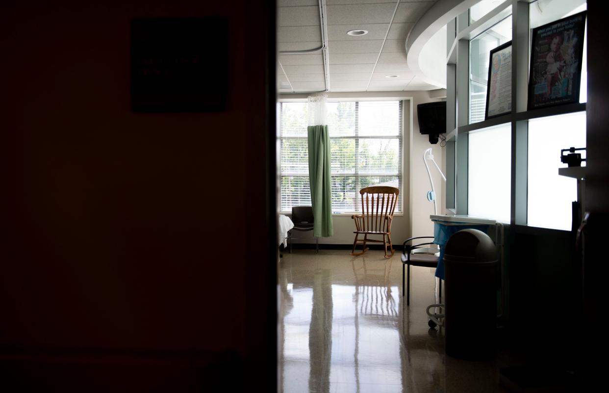 A rocking chair sits in the corner in the early labor triage room at Henry County Medical Center in Paris, Tennessee.