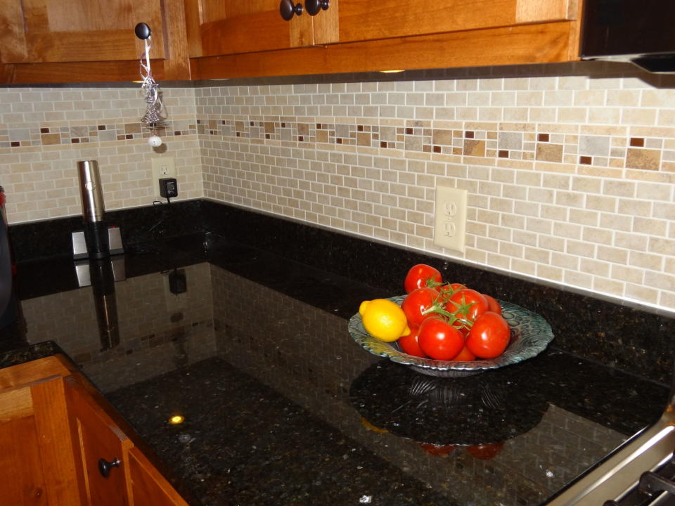 <p>If you watch much HGTV then you know tile backsplashes are suddenly all the rage, and for good reason. They're a great way to spice up your kitchen.</p><p>Subway tile is popular for backsplashes, although mosaic, glass, or accent tiles can add more variety, color, and visual appeal. Besides transforming the boring space between your countertops and upper cabinets into something interesting or even attention grabbing, a tile backsplash makes clean up easier. Food or grease splatters from cooking or food prep just wipes away.</p><p>To make installation faster and easier, use a doubled-sided, peel-and-stick membrane, also called an adhesive tile mat, that sticks to the wall and also holds the tile in place. This eliminates the need for a troweled on adhesive. MusselBound is one brand, which is available at Lowes for $28 that covers 15 sq. ft. This product also lets you grout the same day since you don't have to wait for adhesive to dry.</p>