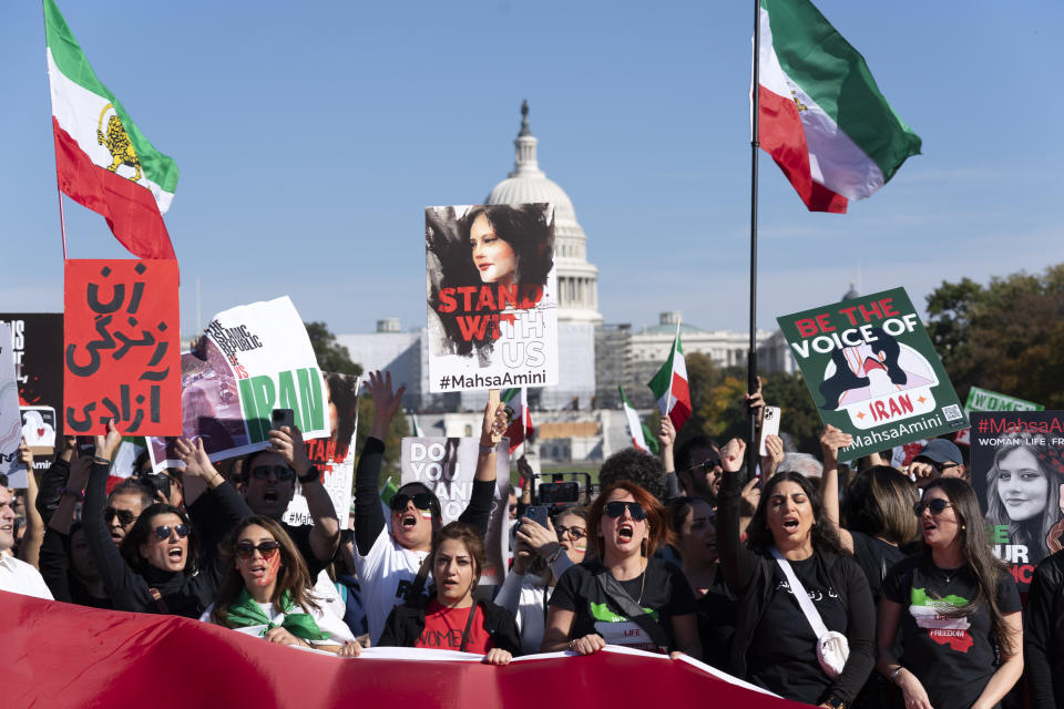 Demonstrators rally at the National Mall to protest against the Iranian regime, in Washington, Saturday, Oct. 22, 2022, following the death of Mahsa Amini in the custody of the Islamic republic's notorious "morality police." (AP Photo/Jose Luis Magana)