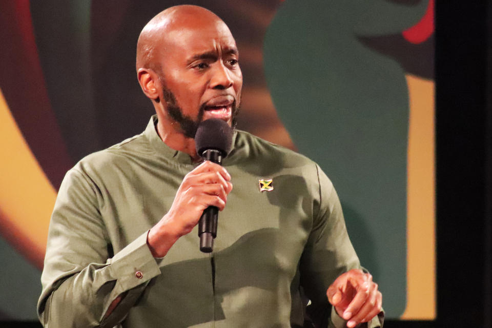 Pastor Trevor Kinlock preaches during the "Caribbean Sabbath" at Metropolitan Seventh-day Adventist Church in Hyattsville, Md., on Saturday, Feb. 18, 2023. He has Jamaican roots. (Adelle M. Banks/RNS via AP)