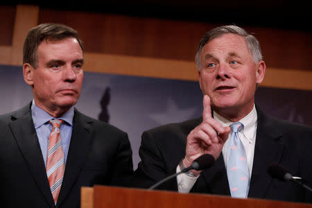 Senate Intelligence Committee Chairman Sen. Richard Burr (R-NC), accompanied by Senator Mark Warner (D-VA), vice chairman of the committee, speaks at a news conference to discuss their probe of Russian interference in the 2016 election on Capitol Hill in Washington, D.C., U.S., March 29, 2017. REUTERS/Aaron P. Bernstein