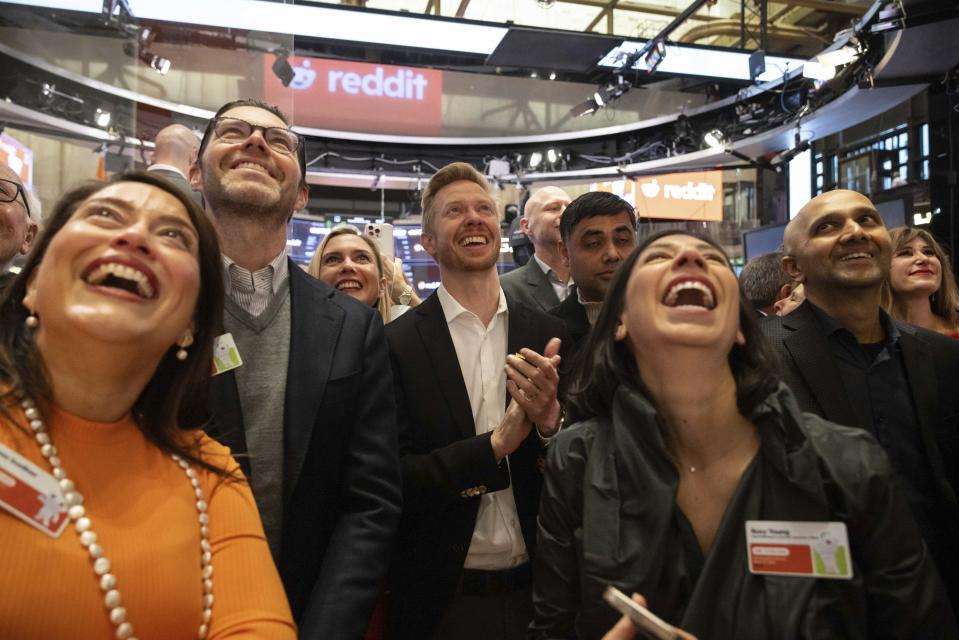 Reddit CEO Steve Huffman and company employees celebrate on the New York Stock Exchange trading floor, prior to his company's IPO, Thursday, March. 21, 2024. (AP Photo/Yuki Iwamura)