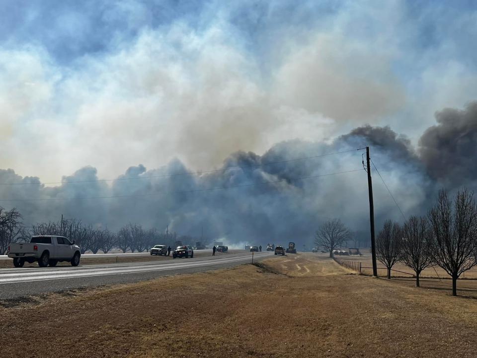 Thick, black smoke from a new wildfire prompted the closing of State Highway 6 between Cisco and Eastland Sunday, March 20, 2022.