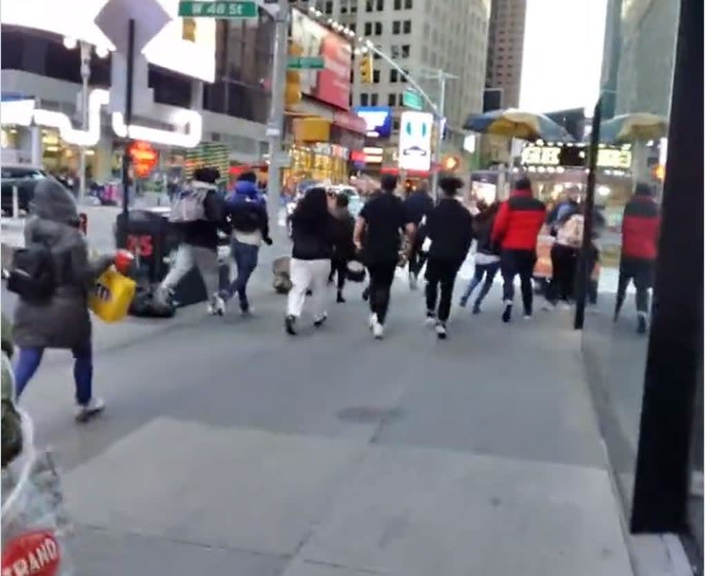 Screengrab from a video which shows people running after manhole explosion (Brad Ball)