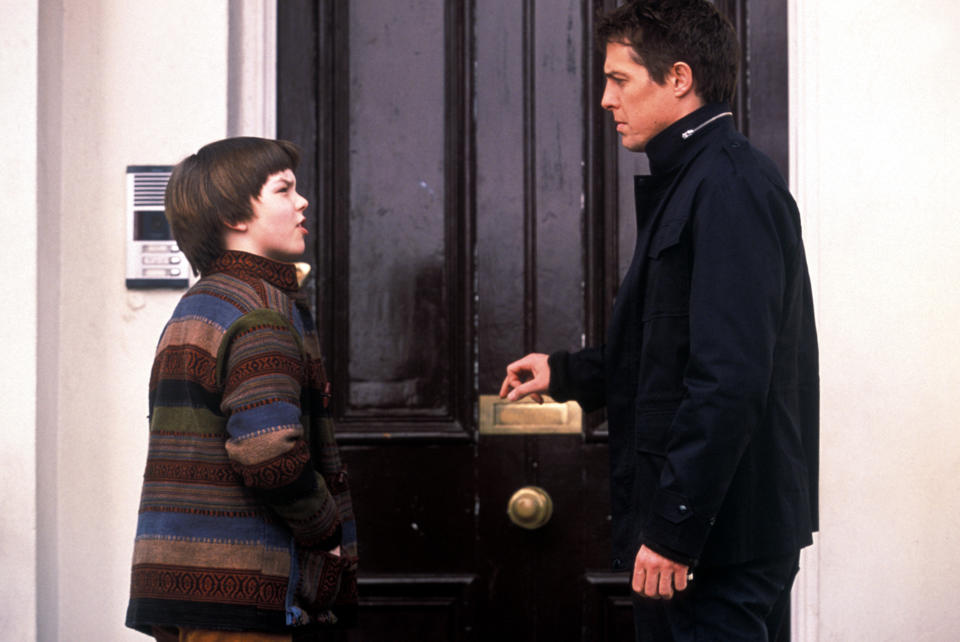 closeup of nick as a kid in the movie opposite hugh grant