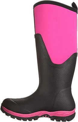 A pair of Muck Boot arctic tall sport boots
