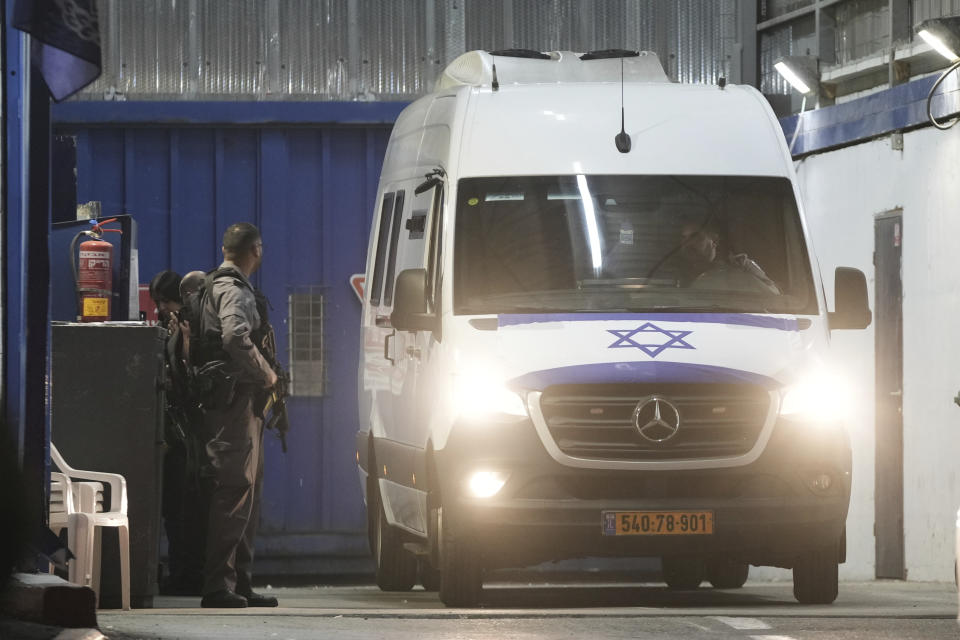 An Israeli prison transport vehicle carries Palestinian prisoners released by the Israeli authorities from Ofer military prison near Jerusalem on Friday, Nov. 24, 2023. The release came on the first day of a four-day cease-fire deal between Israel and Hamas during which the Gaza militants have pledged to release 50 hostages in exchange for 150 Palestinians imprisoned by Israel. (AP Photo/Mahmoud Illean)