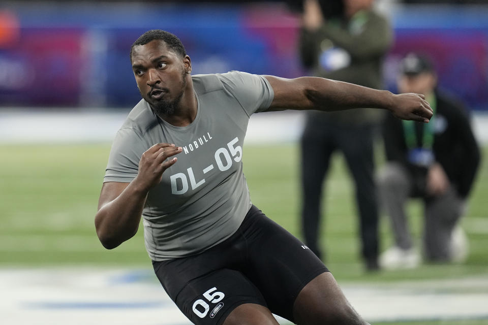 Alabama defensive lineman Justin Eboigbe runs a drill at the NFL football scouting combine, Thursday, Feb. 29, 2024, in Indianapolis. (AP Photo/Darron Cummings)