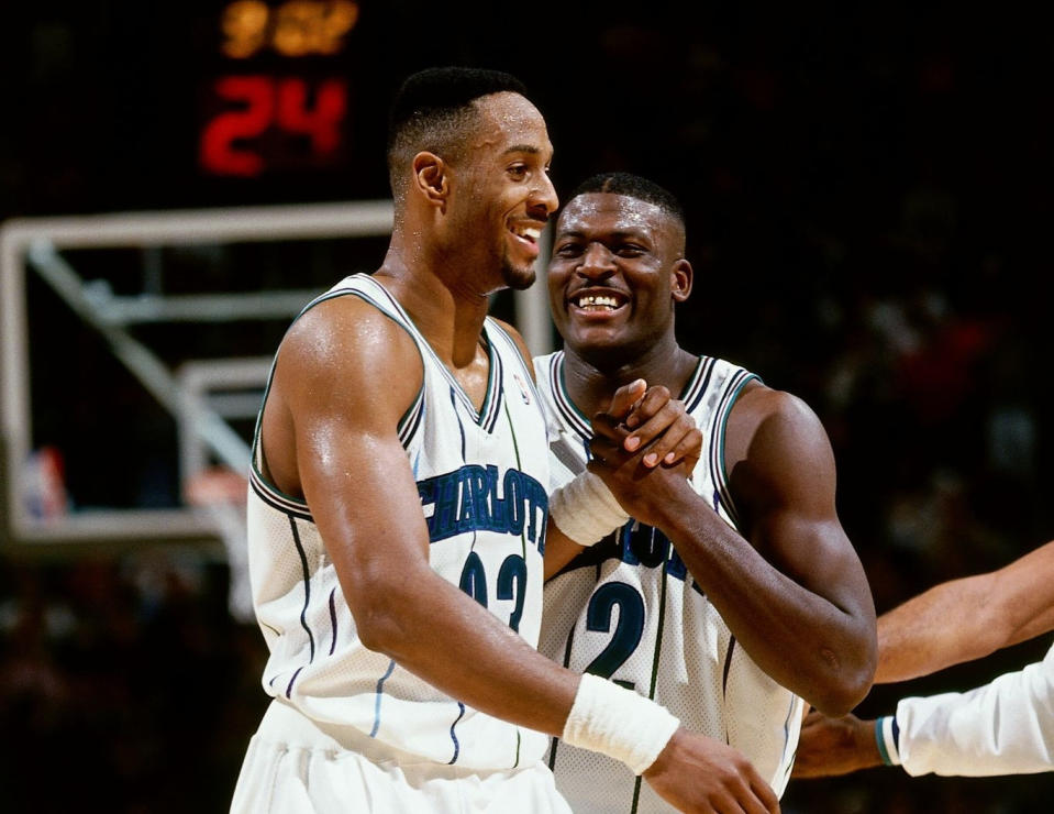 Alonzo Mourning and Larry Johnson