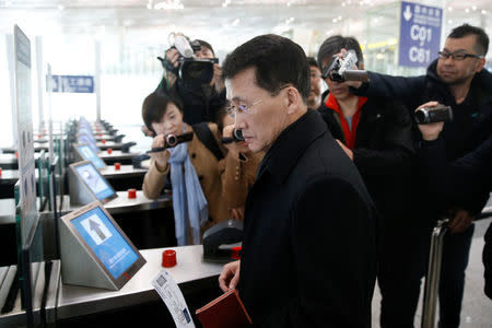 North Korean diplomat Choe Kang Il enters the departure area to board a flight to Helsinki at Capital International Airport in Beijing, China March 18, 2018. REUTERS/Thomas Peter