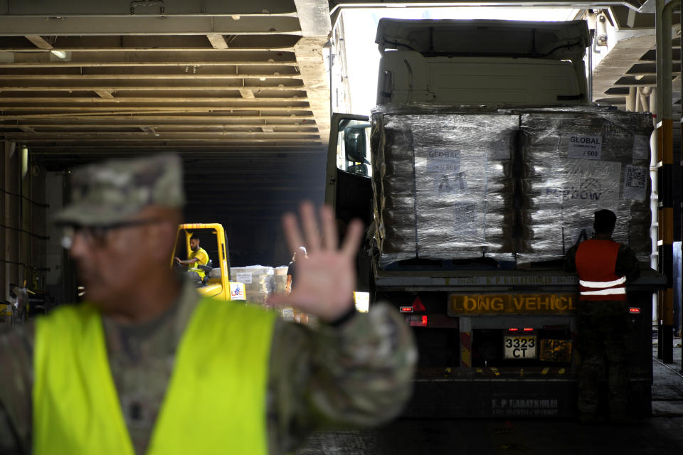 A truck carrying Gaza aid enter a U.S ship for unloading, at the port of Larnaca, Cyprus, Wednesday, June 26, 2024. An official with the U.S. humanitarian assistance agency USAID says thousands of tons of food, medicines and other aid piled up on a Gaza beach isn't reaching those in need because of a dire security situation on the ground where truck drivers are either getting caught in the crossfire or have their cargo seized by "gang-like" groups. (AP Photo/Petros Karadjias)