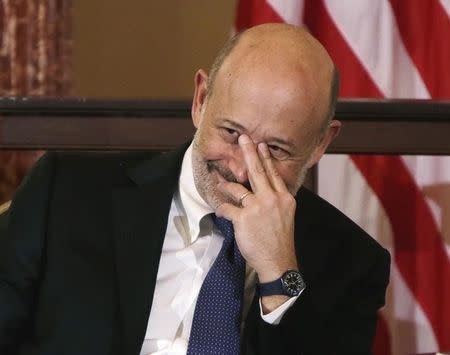 Goldman Sachs Chairman and CEO, Lloyd Blankfein, waits to speak at the 10,000 Women/State Department Entrepreneurship Program at the State Department in Washington, March 9, 2015. REUTERS/Gary Cameron/Files