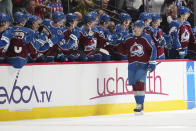 Colorado Avalanche left wing Artturi Lehkonen (62) is congratulated for his goal against the Chicago Blackhawks during the second period of an NHL hockey game Wednesday, Oct. 12, 2022, in Denver. (AP Photo/Jack Dempsey)