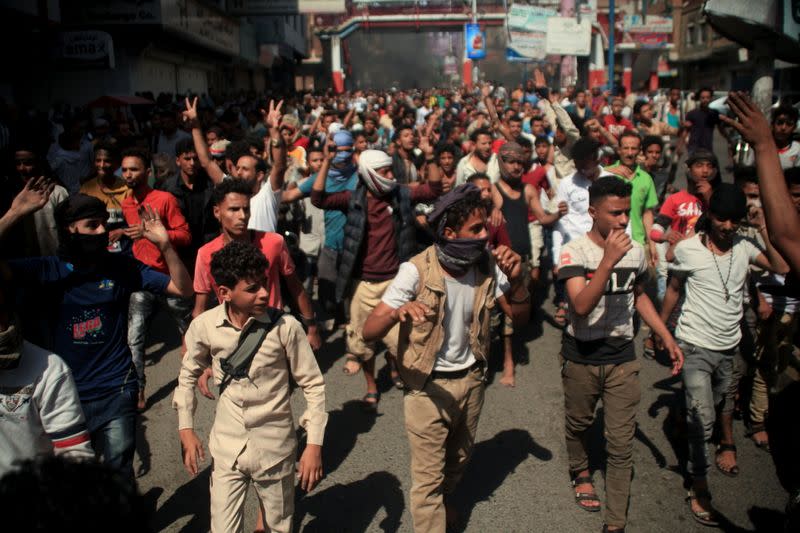 People demonstrate against the deteriorating economic situation and the devaluation of the local currency, in Taiz