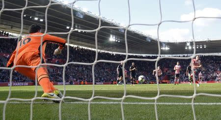 Britain Football Soccer - Southampton v Hull City - Premier League - St Mary's Stadium - 29/4/17 Hull City's Eldin Jakupovic saves a penalty from Southampton's Dusan Tadic Action Images via Reuters / Tony O'Brien Livepic