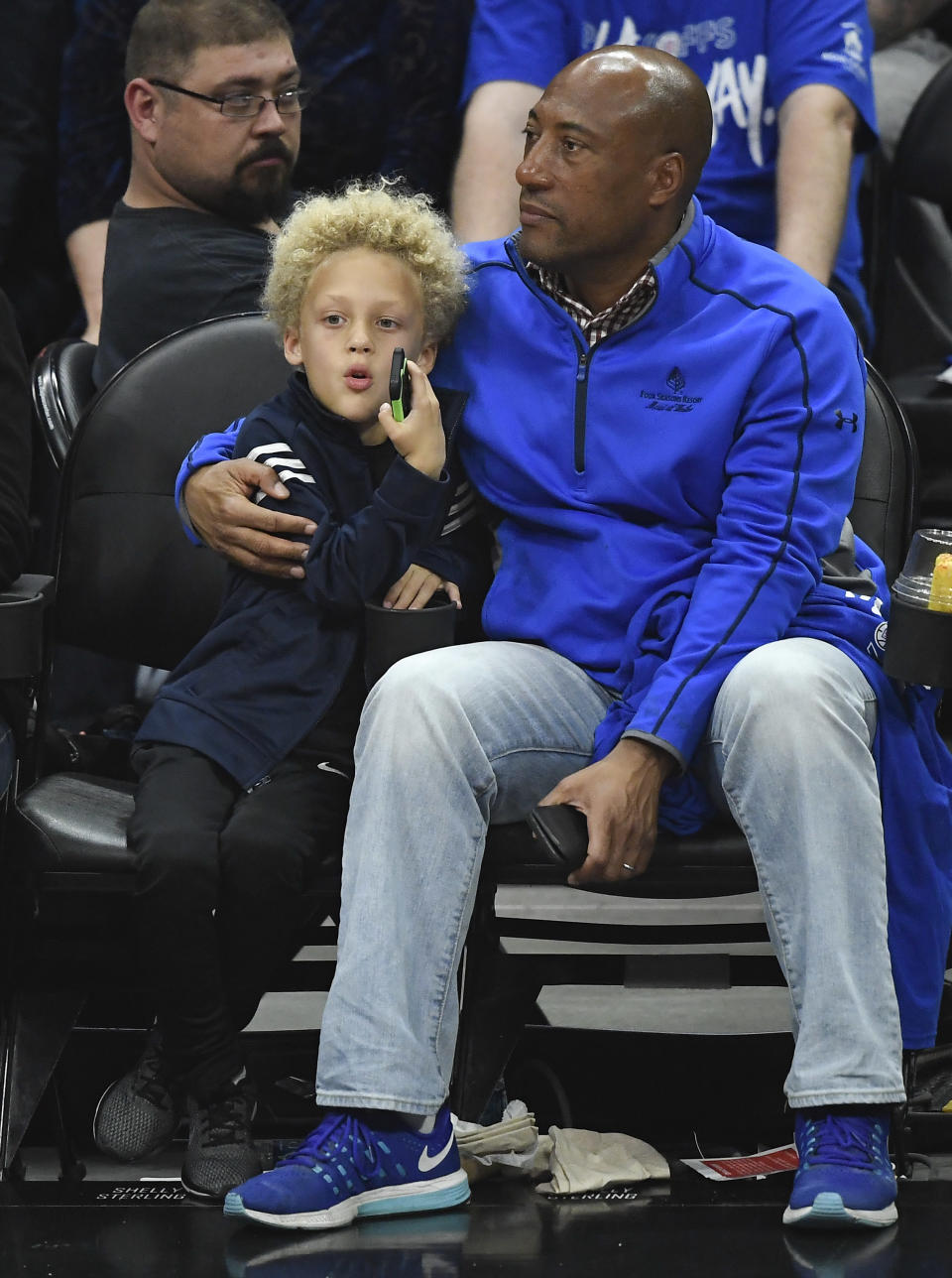 Byron Allen and his son Lucas Allen attend the basketball game between Los Angeles Clippers and Golden State Warriors during Game Six of Round One of the 2019 NBA Playoffs at Staples Center on April 26, 2019 in Los Angeles, California. (Photo by Kevork S. Djansezian/Getty Images)