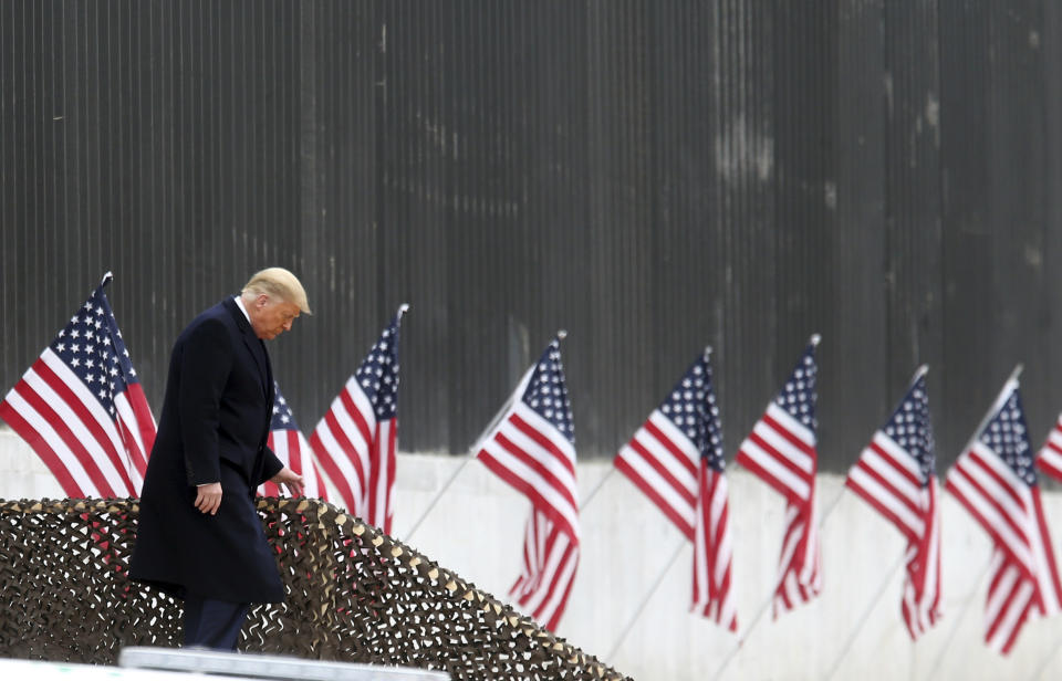 President Donald Trump walks down the steps before a speech near a section of the U.S.-Mexico border wall, Tuesday, Jan. 12, 2021, in Alamo, Texas. (Delcia Lopez/The Monitor via AP)