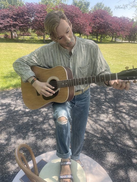 "My Dog Has Fleas" captures a technique to remember the tuning of guitars and ukeleles. The sculpture by Seward Johnson is on display at Memorial Park in Lower Makefield.