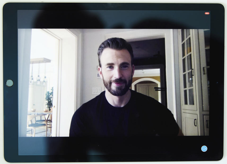 In this July 30, 2020 photo, Chris Evans, co-founder of the civic engagement video-based app "A Starting Point" with Mark Kassen, is photographed on a tablet during a remote portrait session with photographer in Los Angeles and subject in Boston, Mass. (Photo by Matt Sayles/Invision/AP)