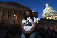 Rep. Cori Bush, D-Mo., speaks with reporters as she camps outside the U.S. Capitol, in Washington, Monday, Aug. 2, 2021, as anger and frustration has mounted in Congress after a nationwide eviction moratorium expired at midnight Saturday. (AP Photo/Jose Luis Magana)