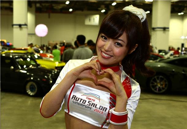 Toshimi Takahashi says the toughest thing about her job as a race queen is having to bear the cold during winter assignments. (Photo: www.Cheryl-Tay.com)